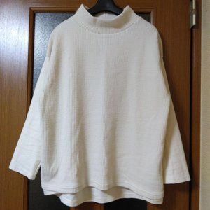 Women's long-sleeved white sweater